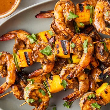 Grilled Shrimp & Mango Skewers marinated shrimp skewered with pieces of mango and a few scallions, then grilled and glazed with a tangy mango chutney bbq sauce