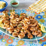 grilled shrimp skewers ron blue platter with lemon wedges