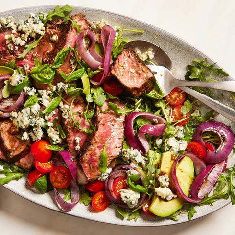 grilled steak salad with avocado, blue cheese, cherry tomatoes and red onions