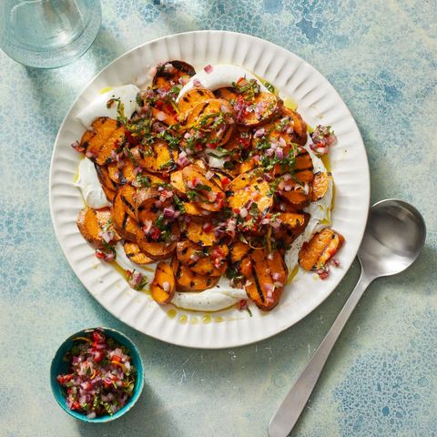 grilled sweet potatoes on a white fluted plate