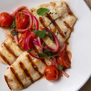 grilled tilapia with red onions and burst cherry tomatoes