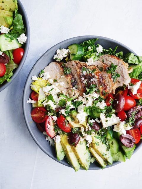 mediterranean grilled chicken salad in a grey bowl