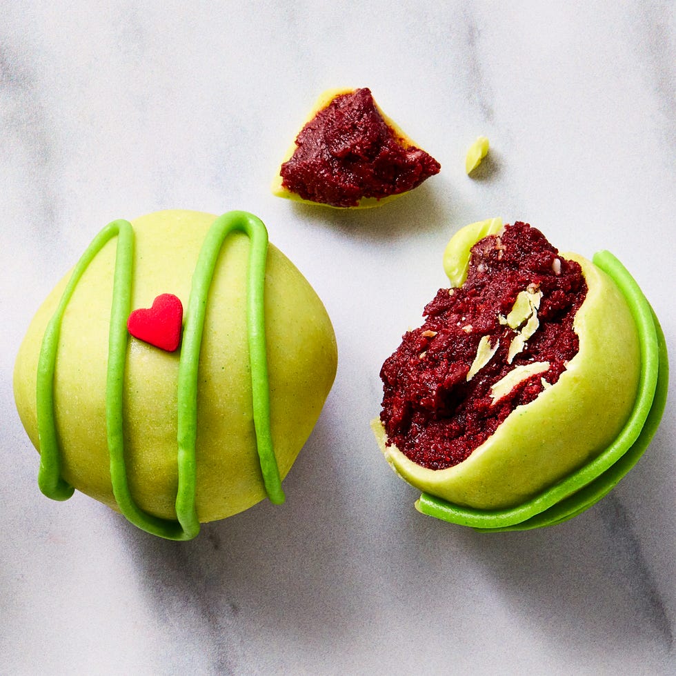 green covered cake bites with red hearts