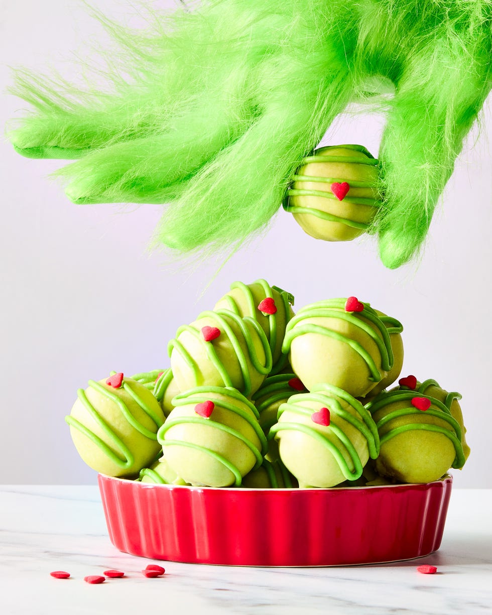 green covered cake bites with red hearts