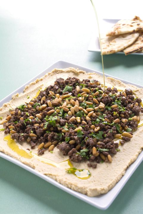 hummus with ground lamb and pine nuts