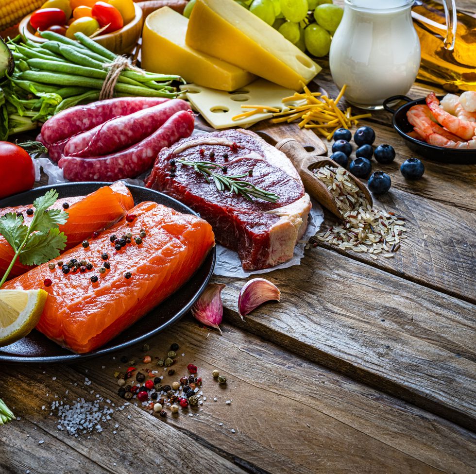 group of food containing carbohidrates protein and dietary fiber shot on wooden table