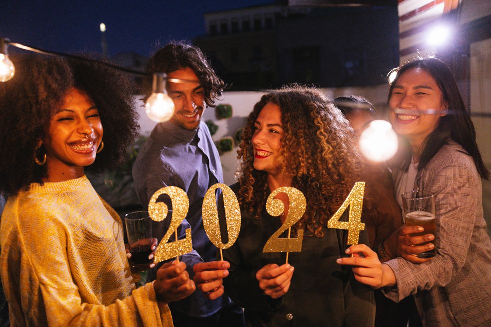 group of friends celebrating 2024 new year