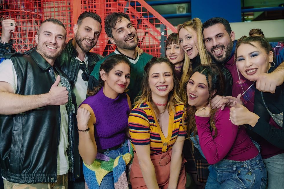group of friends enjoying a 90s themed arcade party