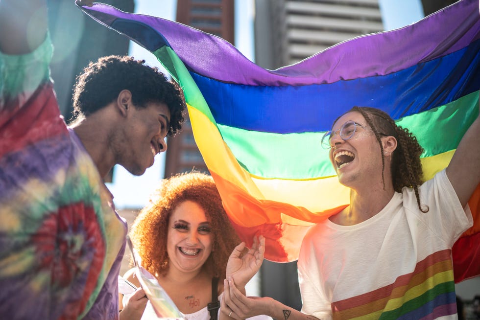 Group of friends enjoying the LGBTQI parade group of friends enjoying the lgbtqi parade