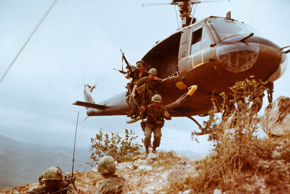 infantrymen leaving helicopter
