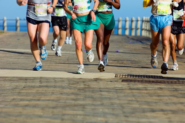 Group of runners on paved road