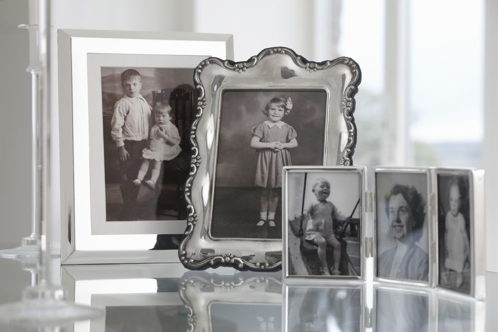 group of vintage framed family photographs