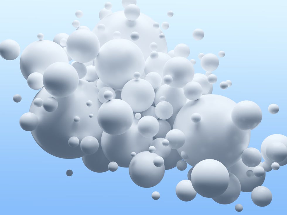 group of white spheres on blue background