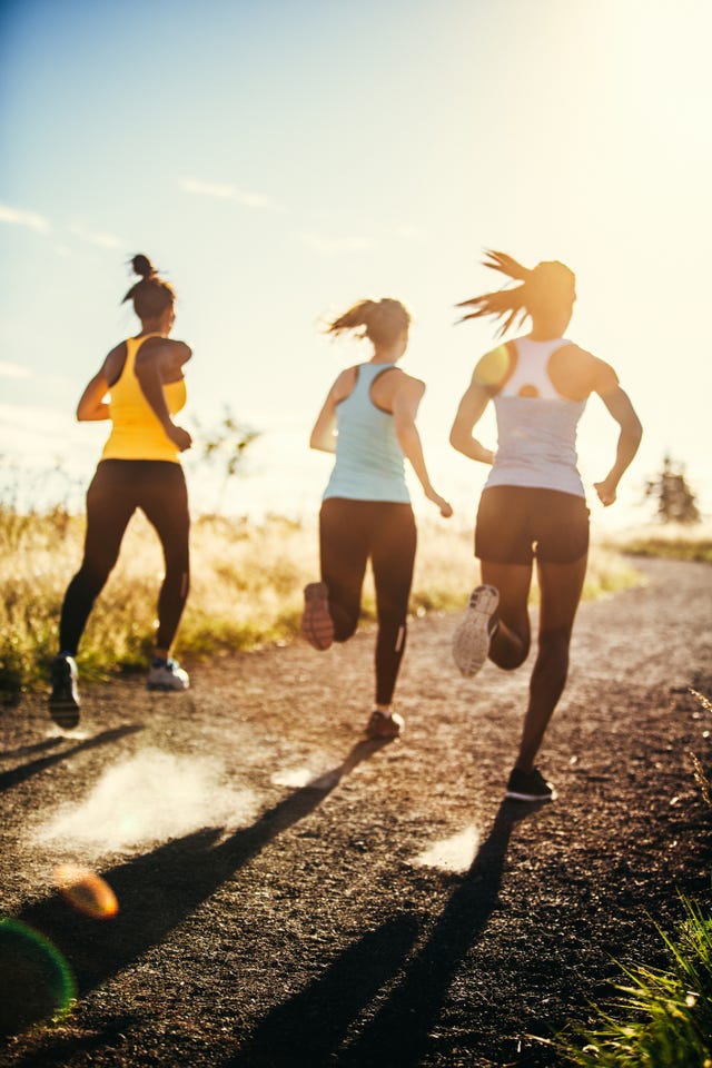 group of women running outdoors