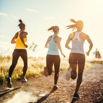 Group of Women Running Outdoors group of women running outdoors