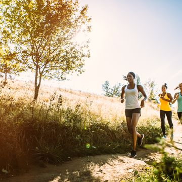 group of women running outdoors