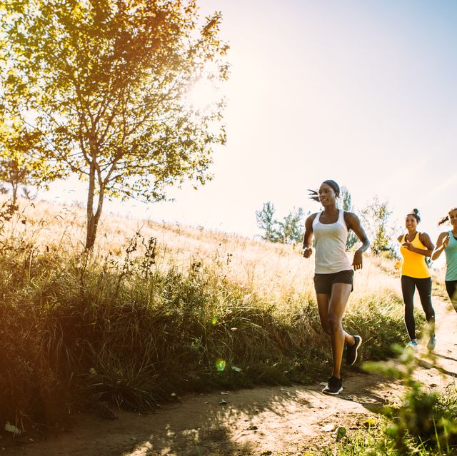 group of women running outdoors
