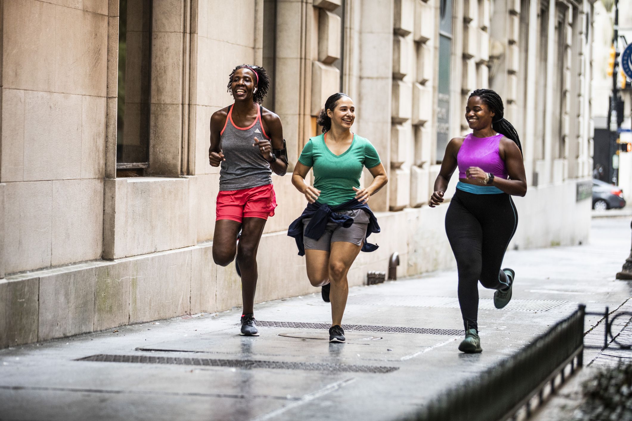 https://hips.hearstapps.com/hmg-prod/images/group-of-women-running-through-urban-area-royalty-free-image-1659458497.jpg