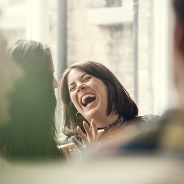 woman laughing with friend