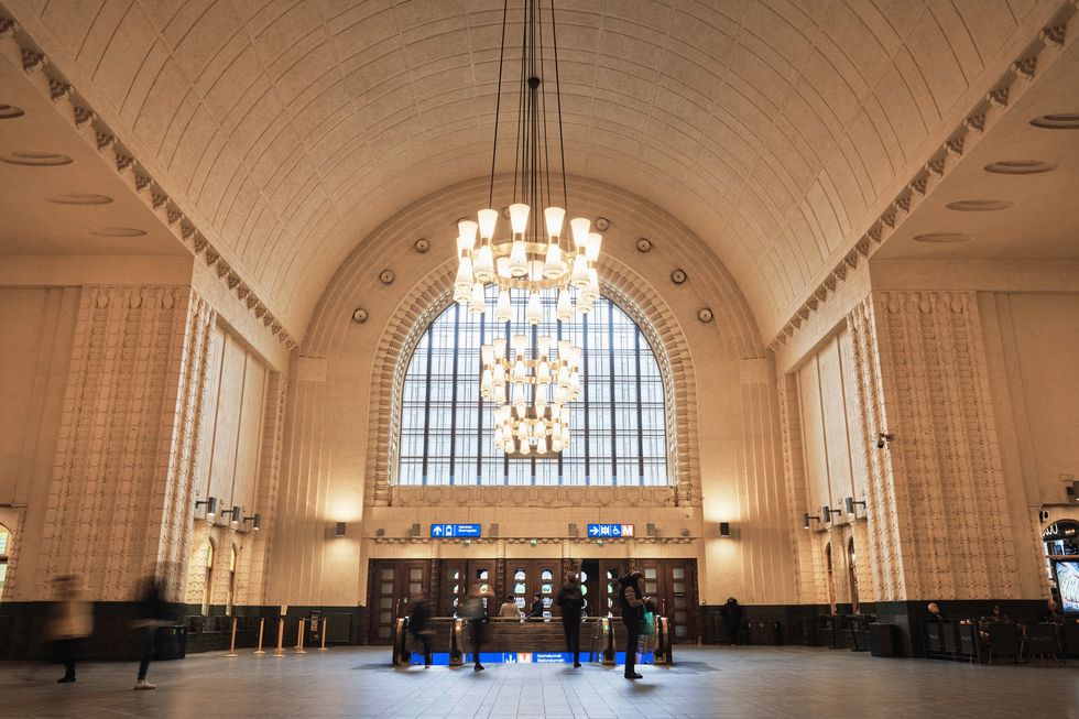 helsinki grand central station with lighting designed by paavo tynell image courtesy of gubi