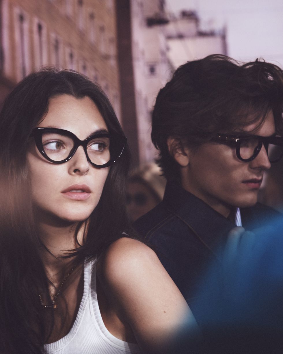 a man and woman wearing glasses
