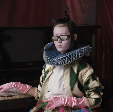 Glasses, Pink, Fashion, Human body, Textile, Performance, Sitting, Photography, Costume, Vision care, 