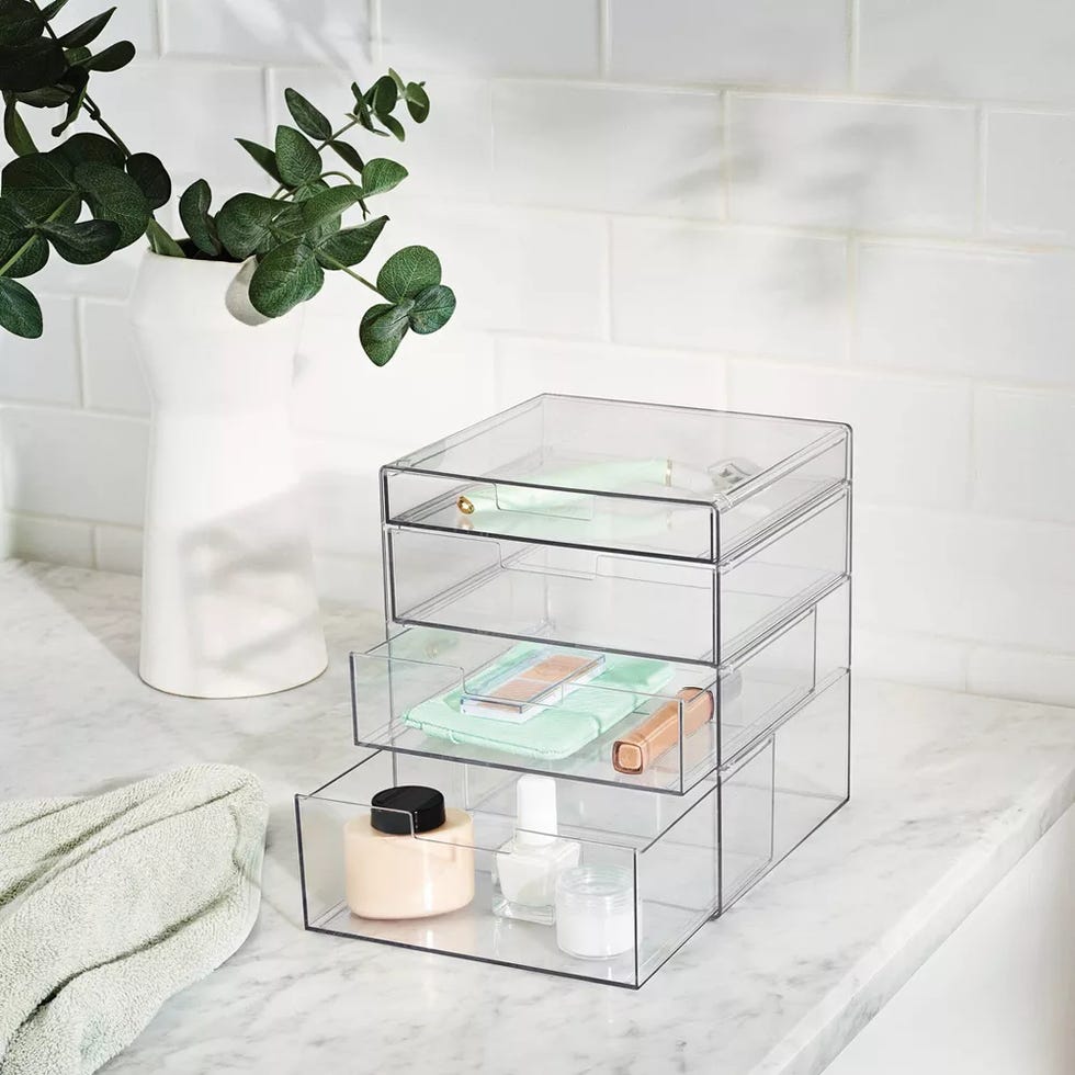 storage organizer for cosmetics and toiletries placed on a marble surface