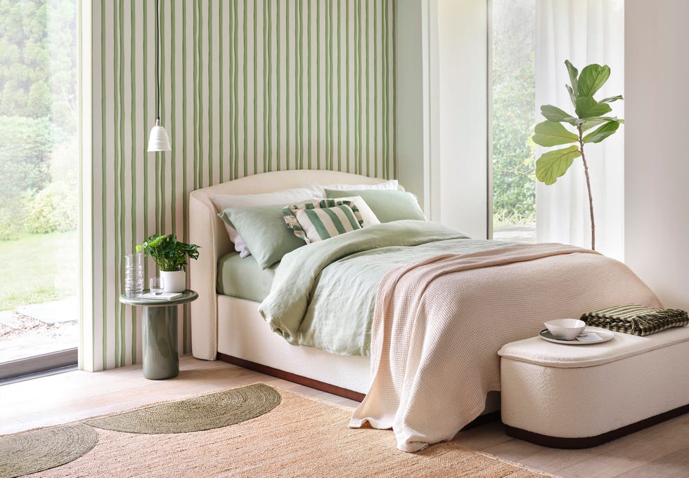 beautifully styled guest bedroom with striped wallpaper, guest bedroom ideas