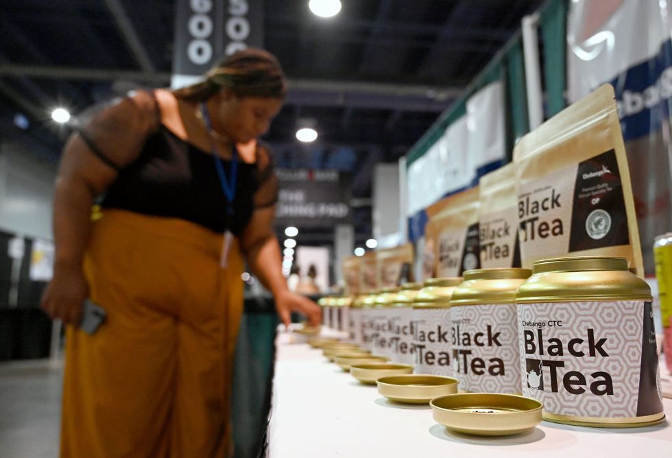 a woman browses tea at the 35th annual nightclub and bar show and world tea expo