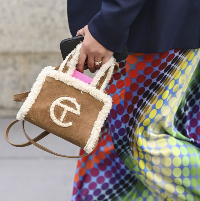 https://hips.hearstapps.com/hmg-prod/images/guest-is-seen-with-a-telfar-bag-outside-the-victor-glemaud-news-photo-1644939825.jpg?crop=0.554xw:0.801xh;0.200xw,0&resize=640:*