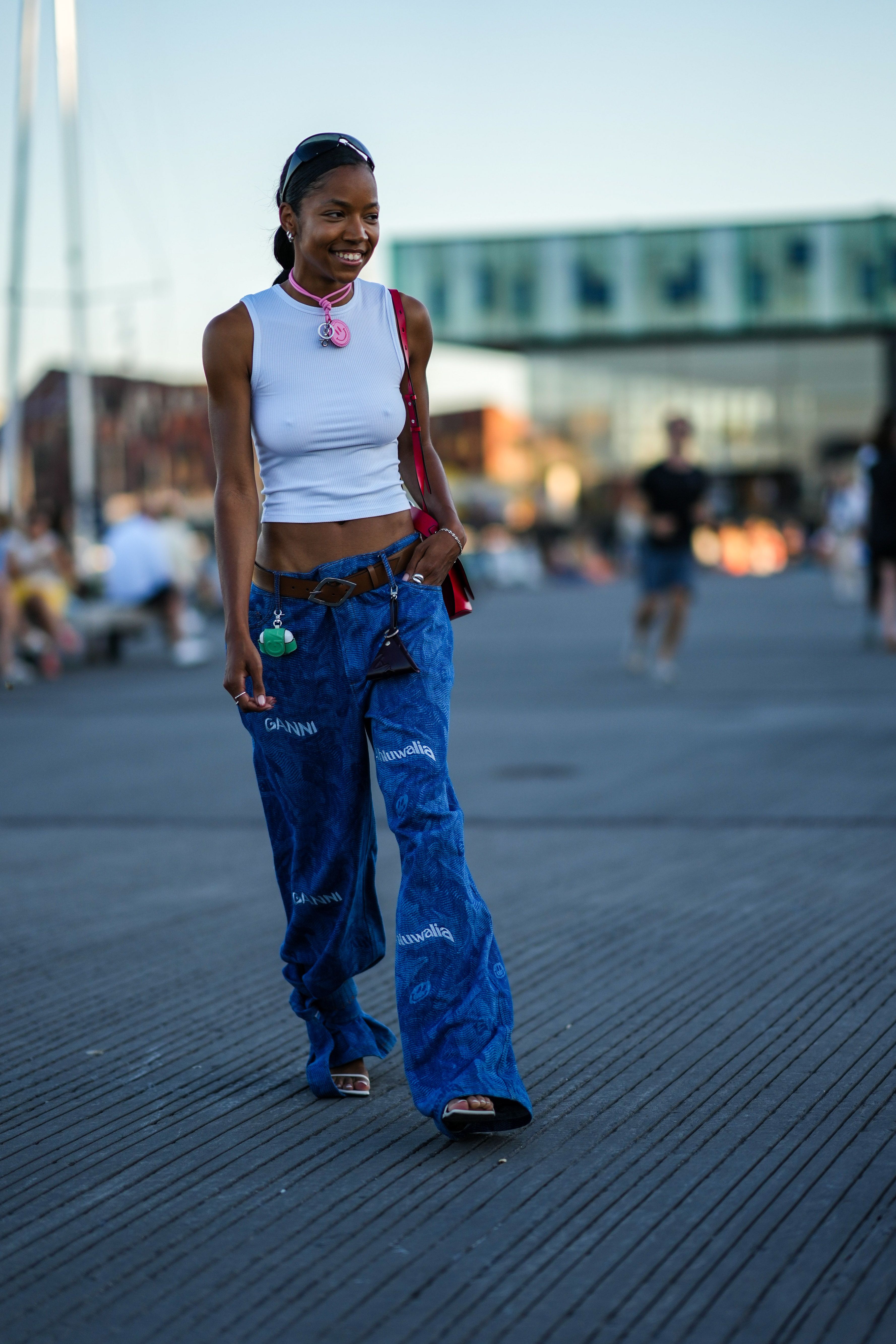 2000s style: wrap top with relaxed fit jeans and gucci boat