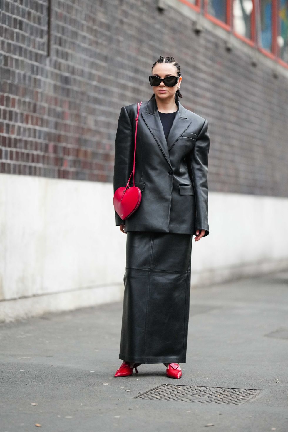 Le Coeur Studded Leather Crossbody Bag in Black - Alaia