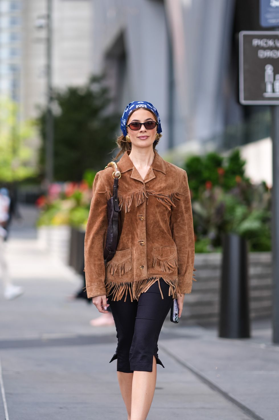 Streetstyle photo of a young woman during New York Fashion Week