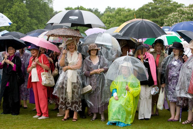 Prince Charles & Camilla Attend Red Cross Garden Party