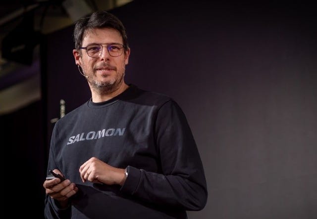 a presenter speaking at an event