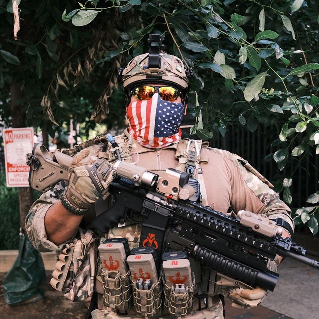 richmond, va    july 04 a man in full military gear pose for photo holding a gun during an open carry protest on july 4, 2020 in richmond, virginia people attended an event in virginia tagged "stand with virginia, support the 2nd amendment" photo by eze amosgetty images
