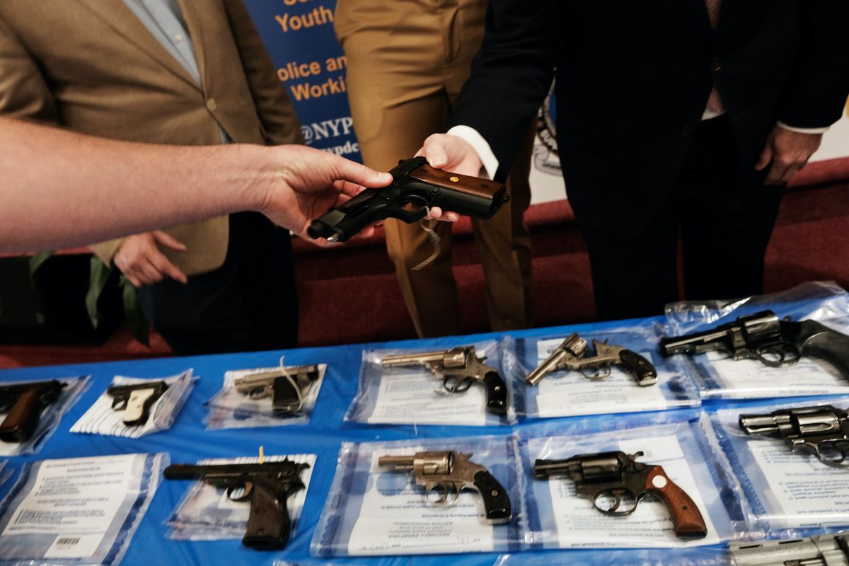 new york, new york   april 24 guns are displayed on a table during a gun buy back event at a church in staten island on april 24, 2021 in new york city the one day event, held at calvary chapel in mariners harbor, will pay a $200 pre paid card to those who turn in an operable handgun or assault rifle, the department said about 50 guns had been turned to the church by the early afternoon and no questions are asked to the origins of the weapon the nypd, the district attorney and others have organized the event as gun arrests have more than doubled so far this year on staten island people can also receive a $25 pre paid card for rifles, shotguns and airguns photo by spencer plattgetty images