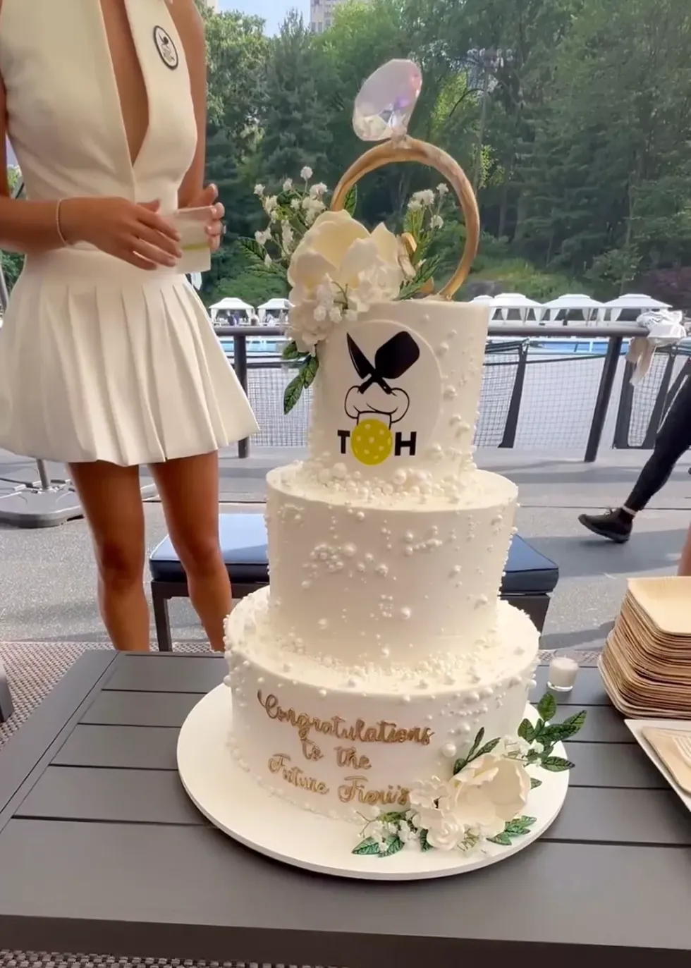 a white engagement party cake