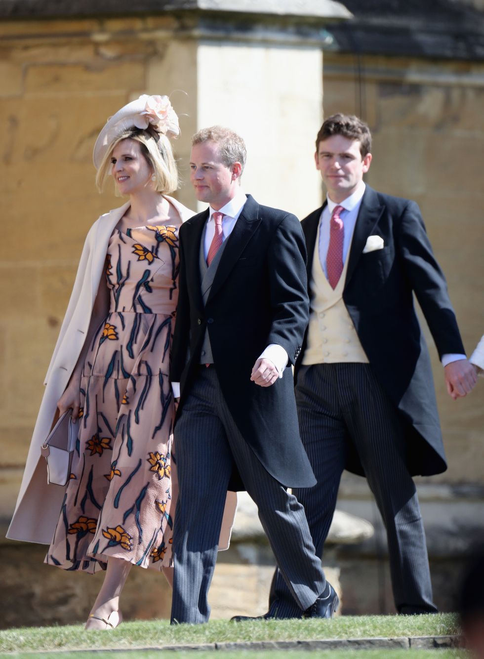 guy pelly centre attending meghan and harry's wedding in 2018, with wife lizzy left and fellow friend of the royals, james meade ﻿right