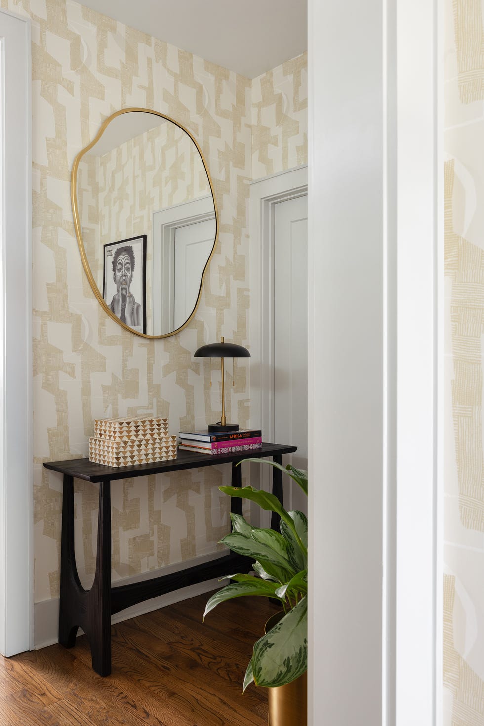 hallway decor featuring a console table and mirror