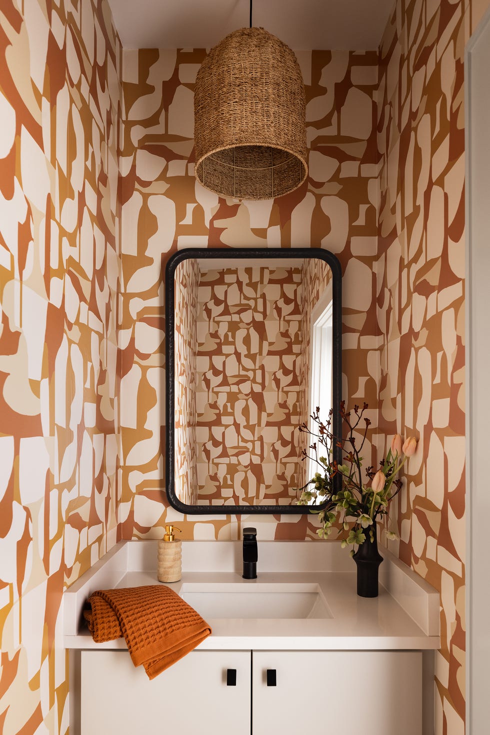 powder room with geometric wallpaper