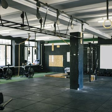 A Gym Scene With Various Equipment