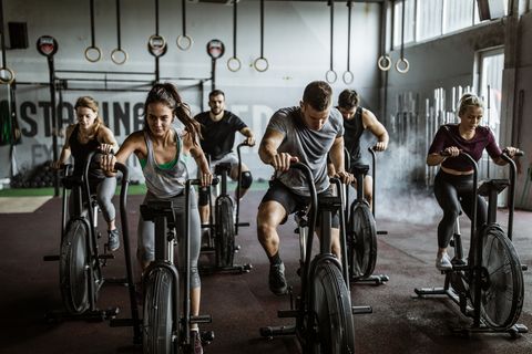 gym workout on stationary bikes