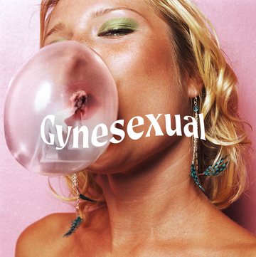woman blowing bubble with bubble gum