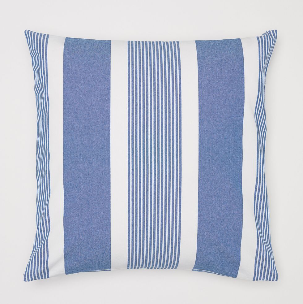white and blue striped cushion