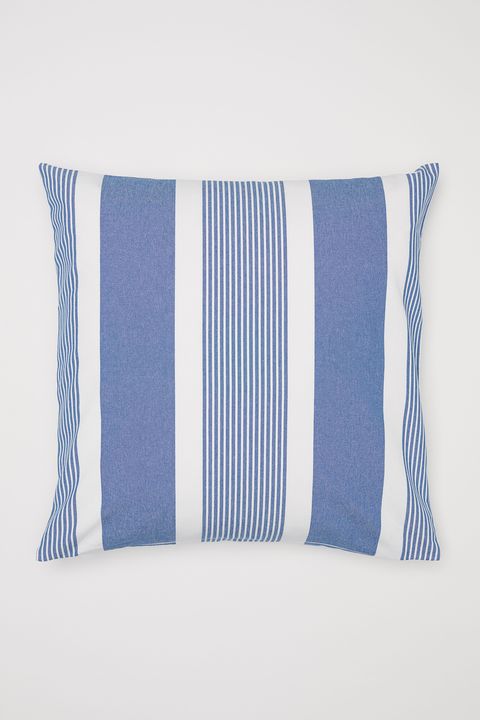 white and blue striped cushion