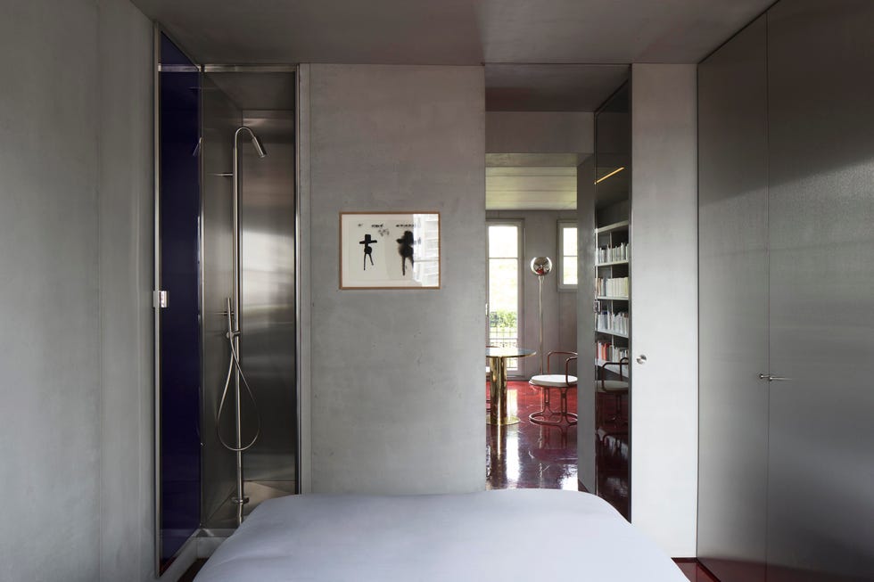minimalist concrete bedroom and ensuite