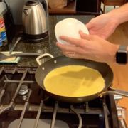 tiktok clean counter hack using a bowl of eggs over a pan