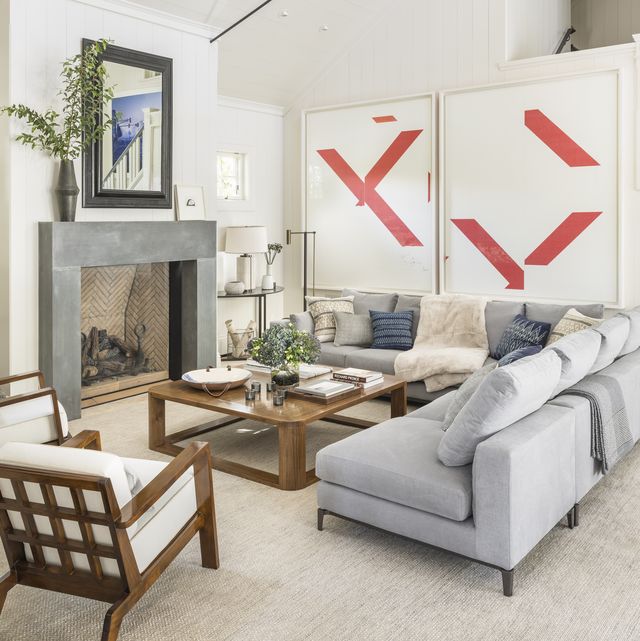 living room, fireplace, gray sofa, artwork