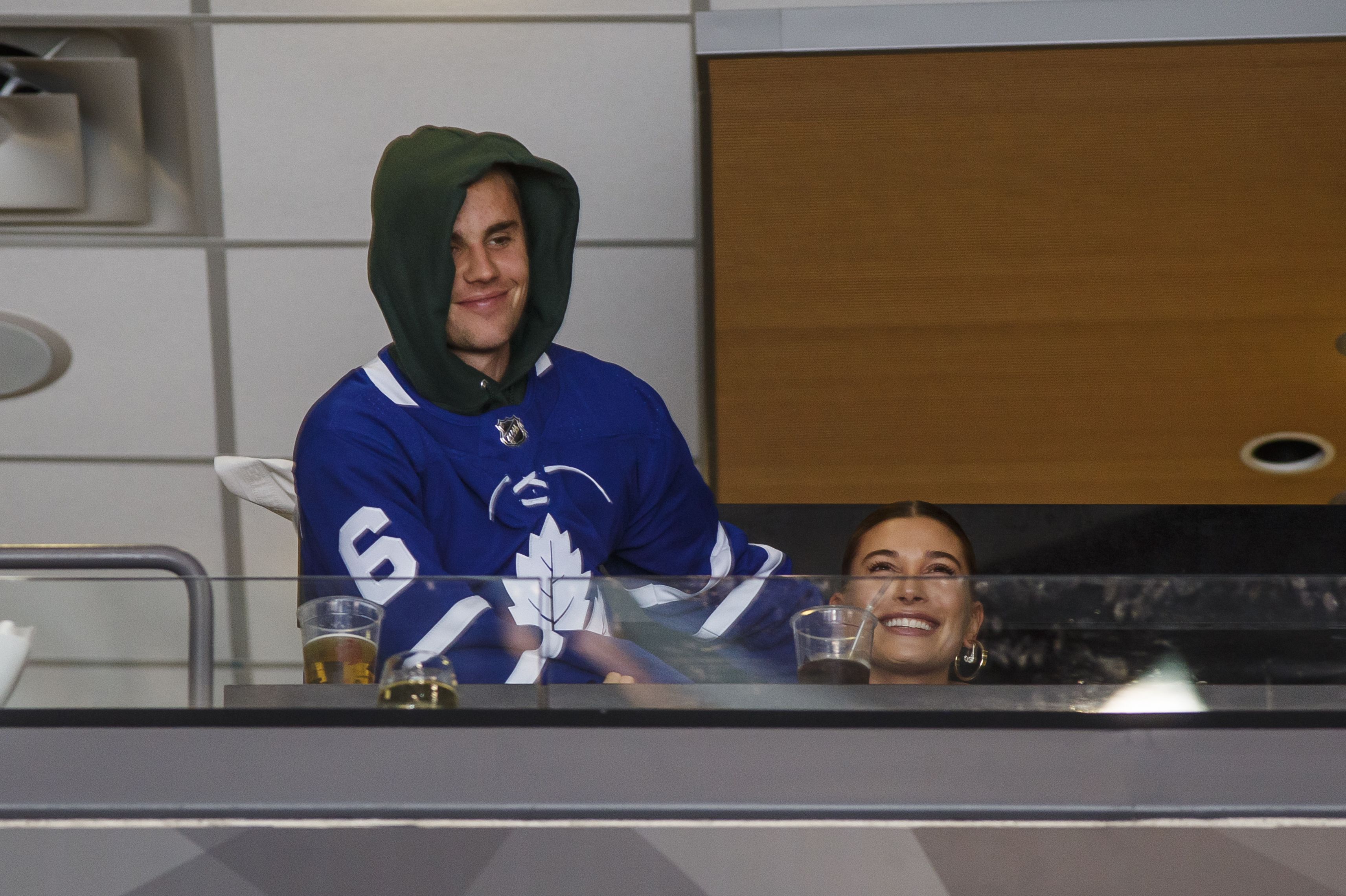 Justin and Hailey Bieber Wore Matching Jerseys at a Toronto Maple Leafs  Hockey Game